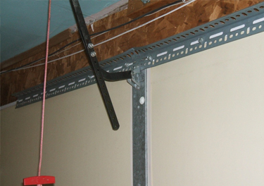 garage door bracket repair in in Northridge